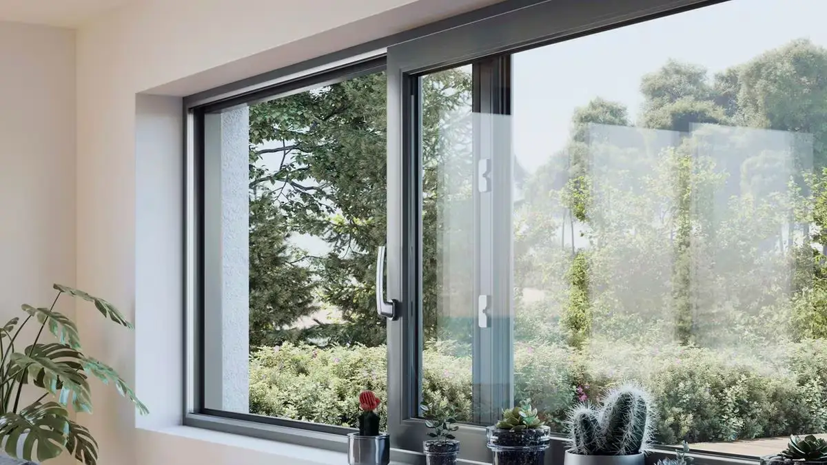 Menuisier Auderghem qualifié effectuant la pose de double vitrage sur mesure sur de nouveaux châssis PVC et Alu Auderghem pour une isolation thermique optimale à 1160.