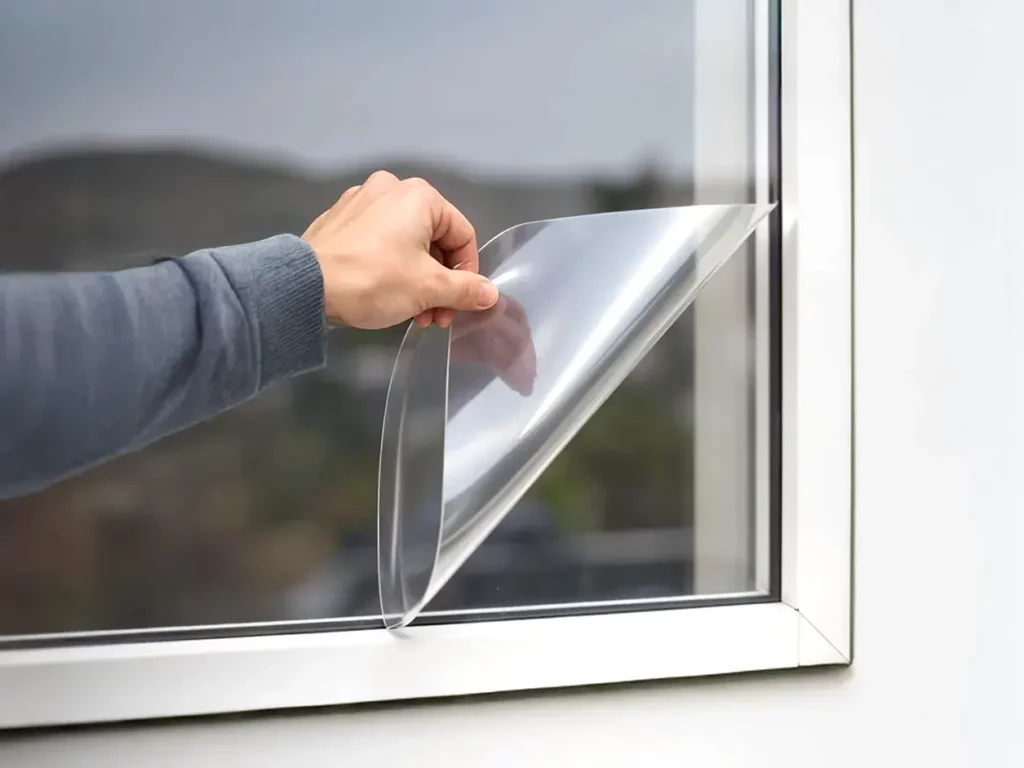 Installation de sécurisation de vitrage anti-effraction à Auderghem sur châssis haute performance.